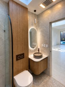 Small bathroom renovation, Ryde NSW, after, floating vanity and backlit mirror